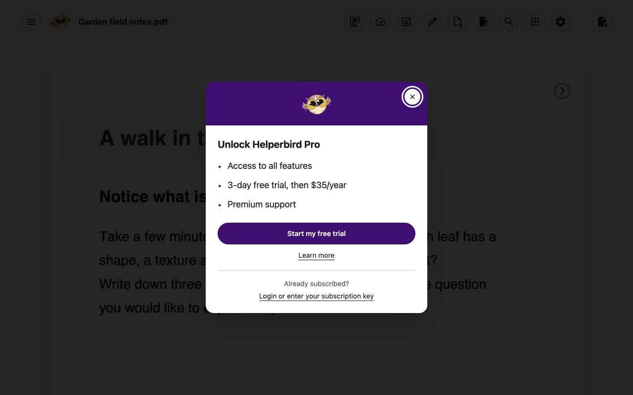 Unlock Helperbird Pro dialog with three benefits, trial and annual price details, a trial button, and a separate link for existing subscribers.