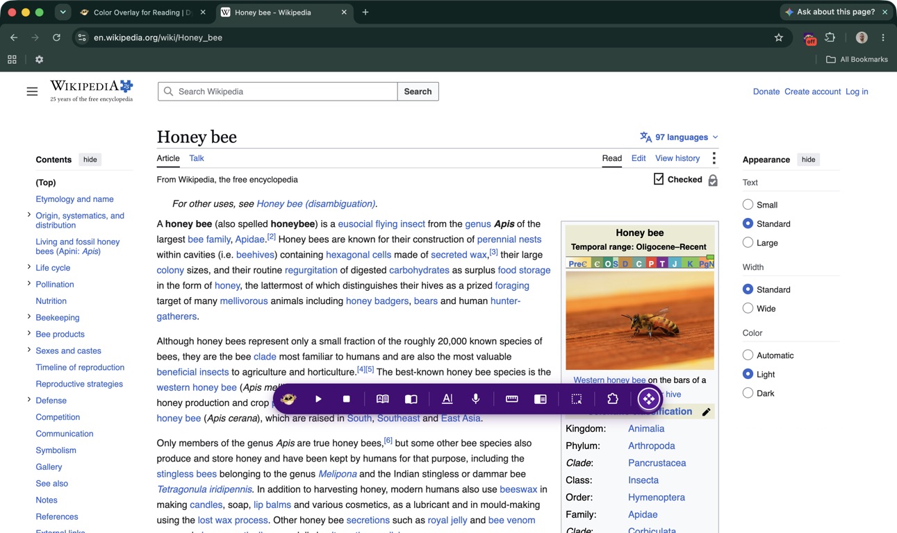 The same article with Helperbird's purple toolbar expanded, showing reading and writing tools.