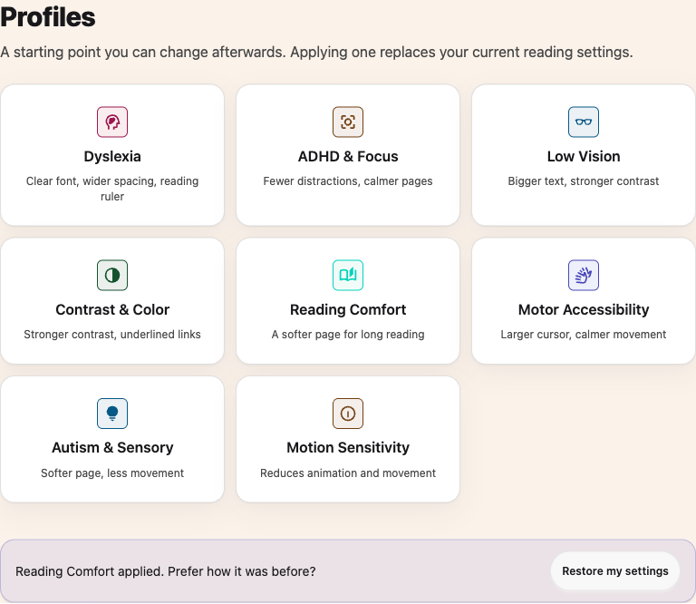 The eight accessibility profile cards, with Reading Comfort applied and the Restore my settings button below them.